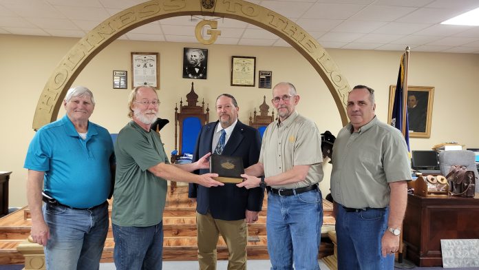 Larry Cox donates 1910 The Illustrated History of Free Masonry