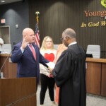 Photo credit: Larry Cox Photo: Jean Paul "JP" Broussard taking the oath of office for Youngsville Police Chief.